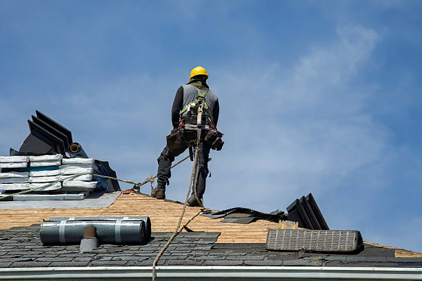 Professional Roof Replacement technician working in Carmel, IN